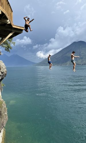 Jumping into Lake Atitlan.